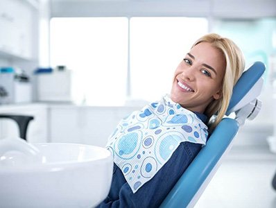 Woman smiling during dental office visit in Annandale Virginia