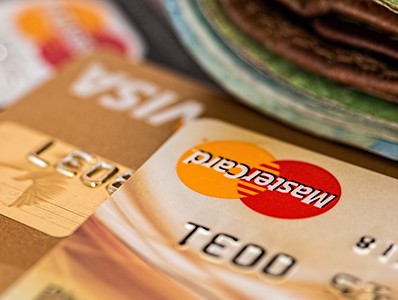 Credit cards and wallet on wooden table