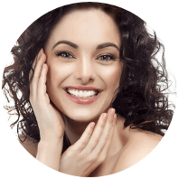 Smiling woman with dark curly hair