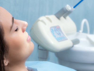 Woman under dental sedation resting during dentistry visit