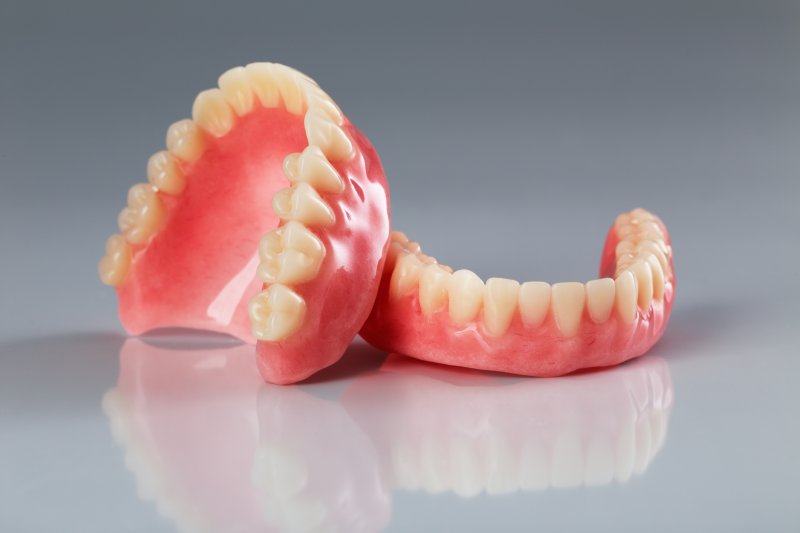 pair of dentures lying on a table