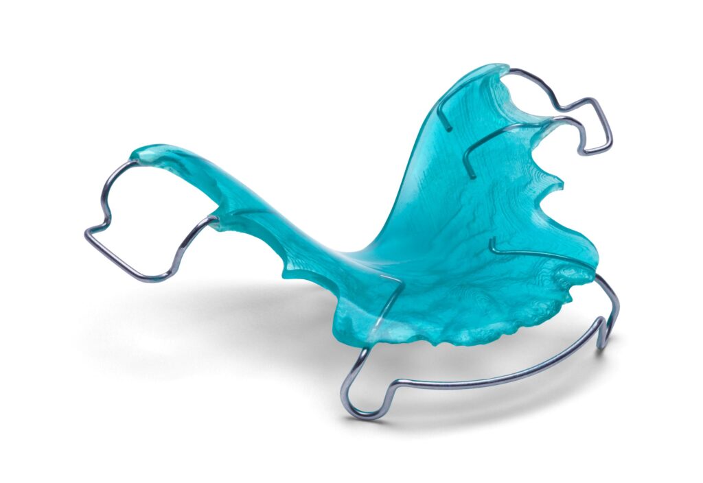 Blue retainer on white surface