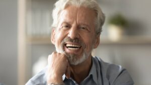 ALT Image: Man with dentures smiling